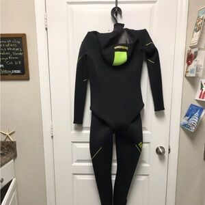 Women’s Jock Cousteau style 8 mm wetsuit.
